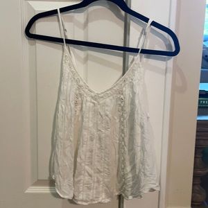 White lace detailing flowy crop tank